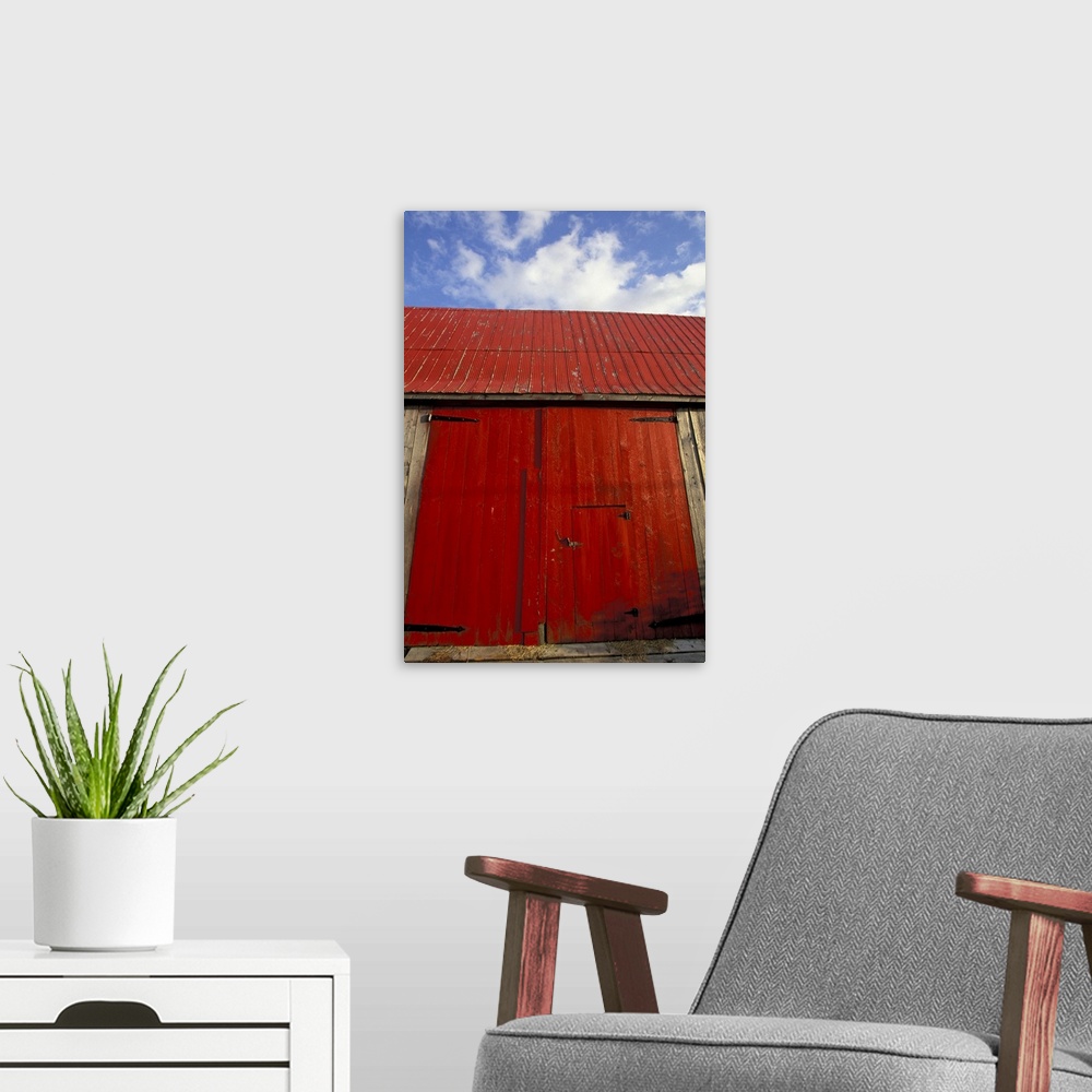 A modern room featuring NA, Canada, New Brunswick, Shepody.Red barn door