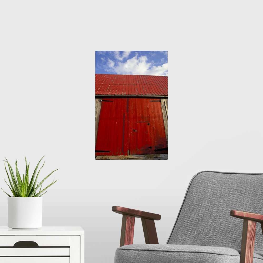 A modern room featuring NA, Canada, New Brunswick, Shepody.Red barn door