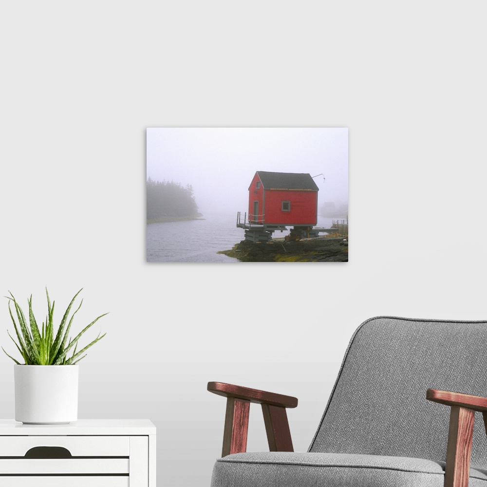 A modern room featuring N.A. Canada, Nova Scotia, Stonehurst.  Red fishing shed in fog.