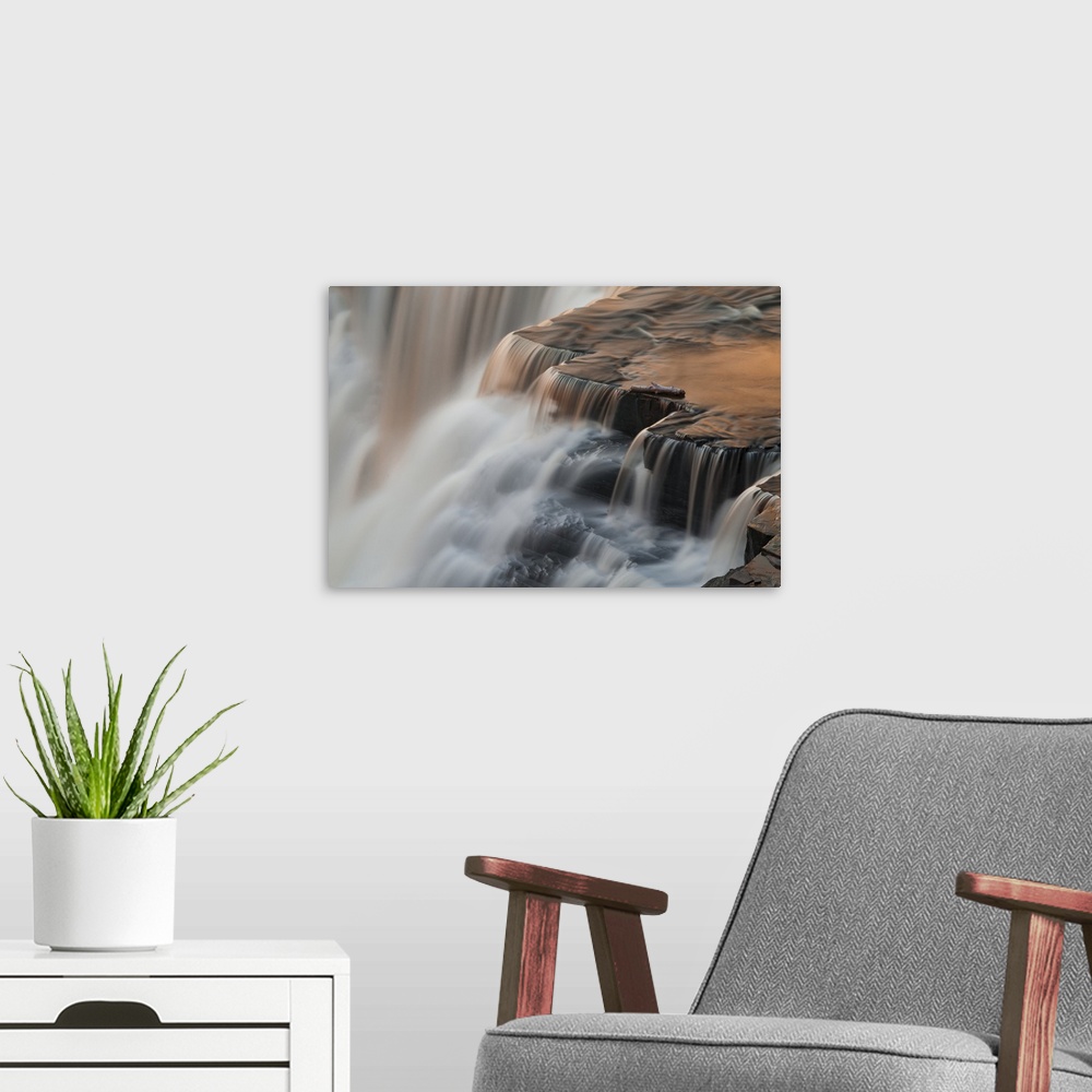 A modern room featuring Canada, Ontario. Detail of sunset reflections on Kakabeka Falls.