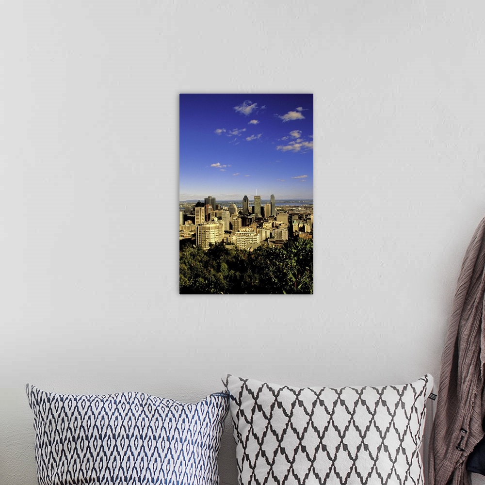 A bohemian room featuring North America, Canada, Quebec, Montreal. City skyline from Mount Royal Park Obsevatory