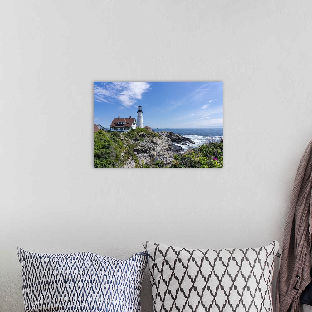 A bohemian room featuring Cape Elizabeth, Maine, USA. Portland Head Light is a historic lighthouse that sits on a head of l...