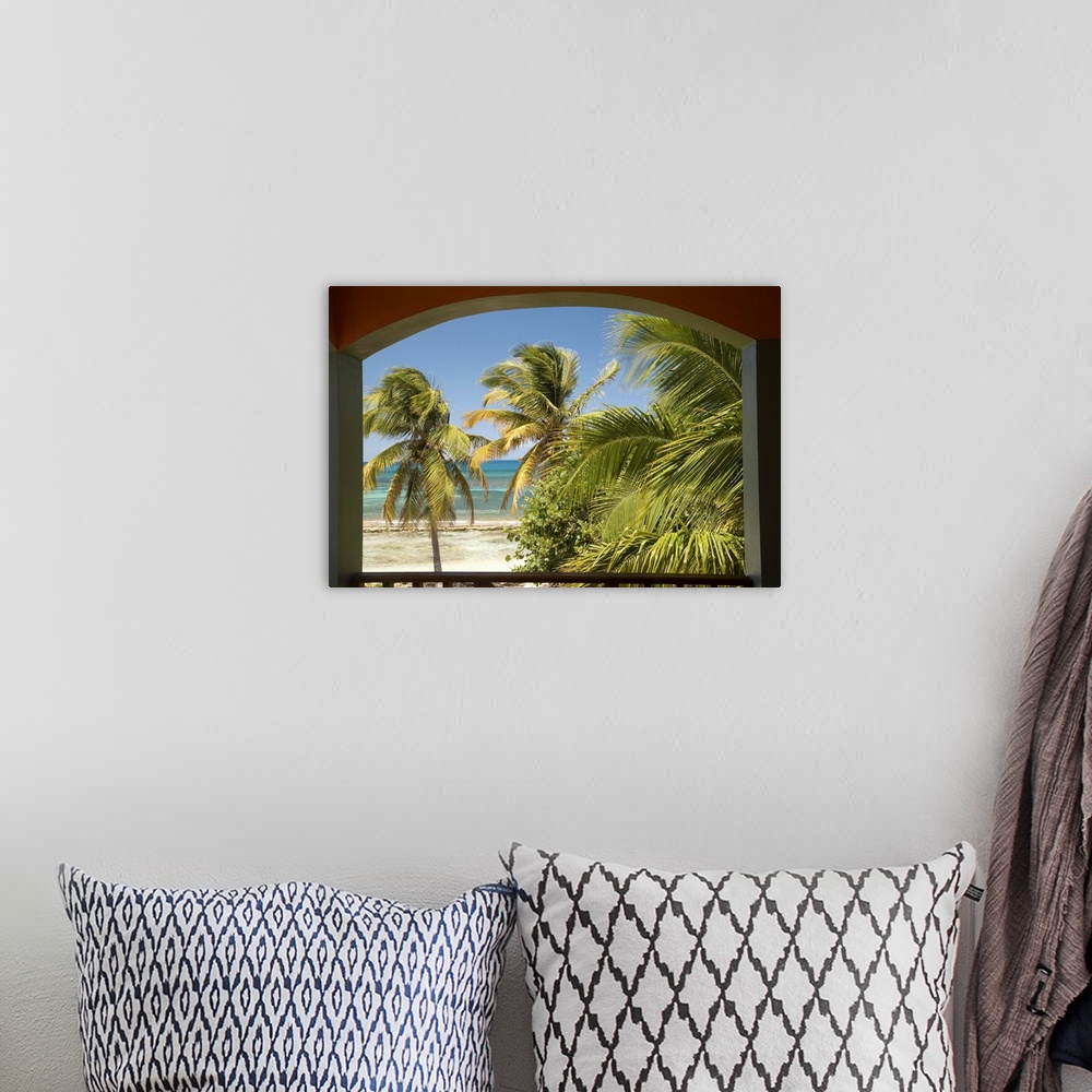 A bohemian room featuring Caribbean, Puerto Rico, Vieques.  Caribbean, beach and palm trees, viewed from porch of house/hot...