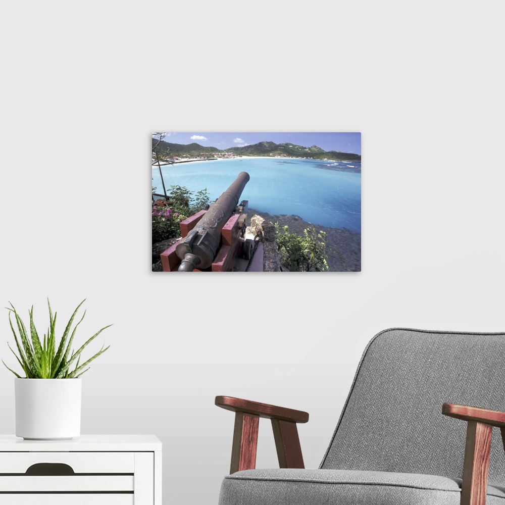 A modern room featuring CARIBBEAN, Saint Barts.Cannon aiming into Bay of St. Jean
