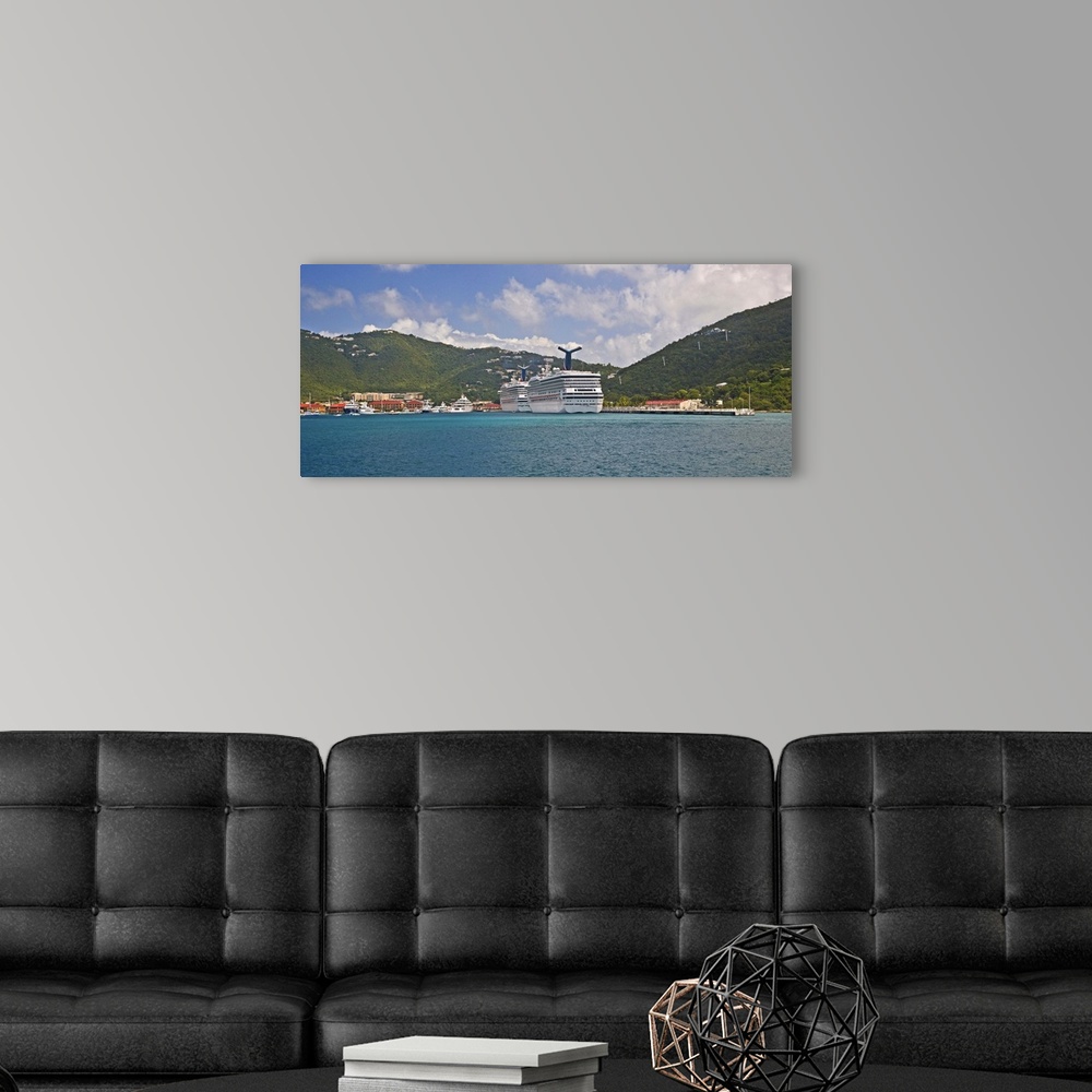 A modern room featuring Carnival Cruise Line ships "Truimph" and "Glory"