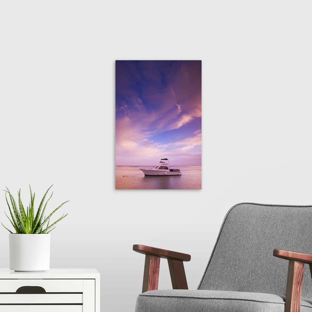 A modern room featuring CAYMAN ISLANDS - CAYMAN BRAC - West End: Sunset with Dive Boats