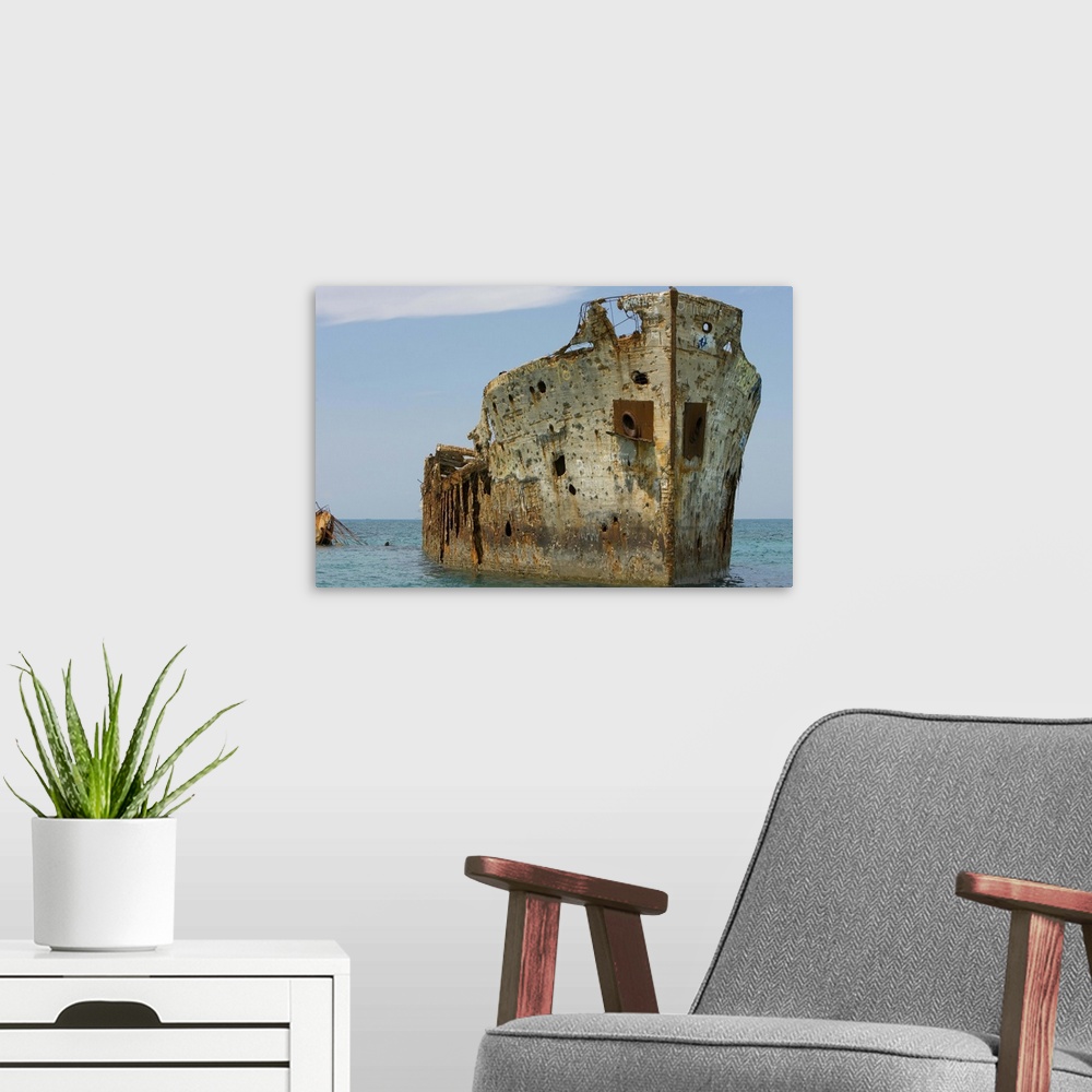 A modern room featuring Cement ship wreck in Barnett Harbour, South Bimini, Bahamas