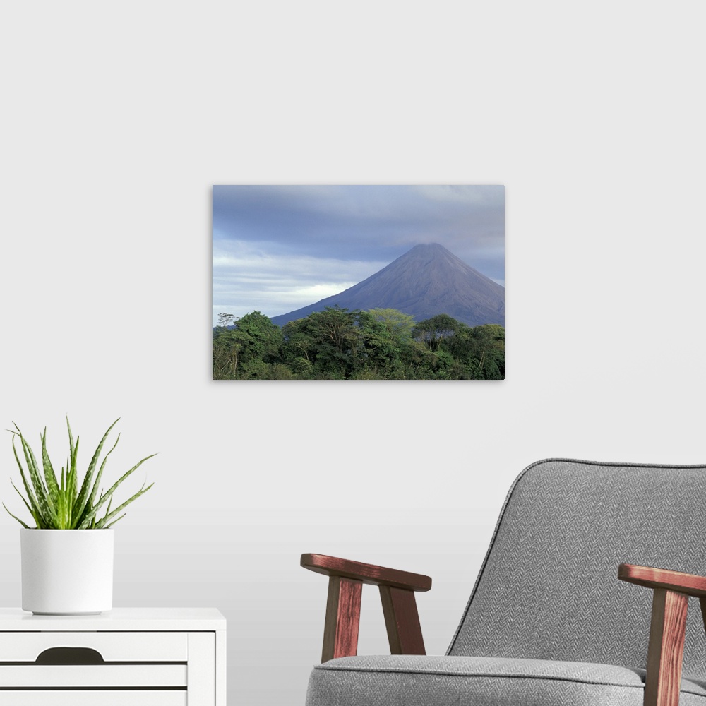 A modern room featuring Central America, Costa Rica, Arenal Volcano. Rainforest beneath Arenal (erupting since 1968).