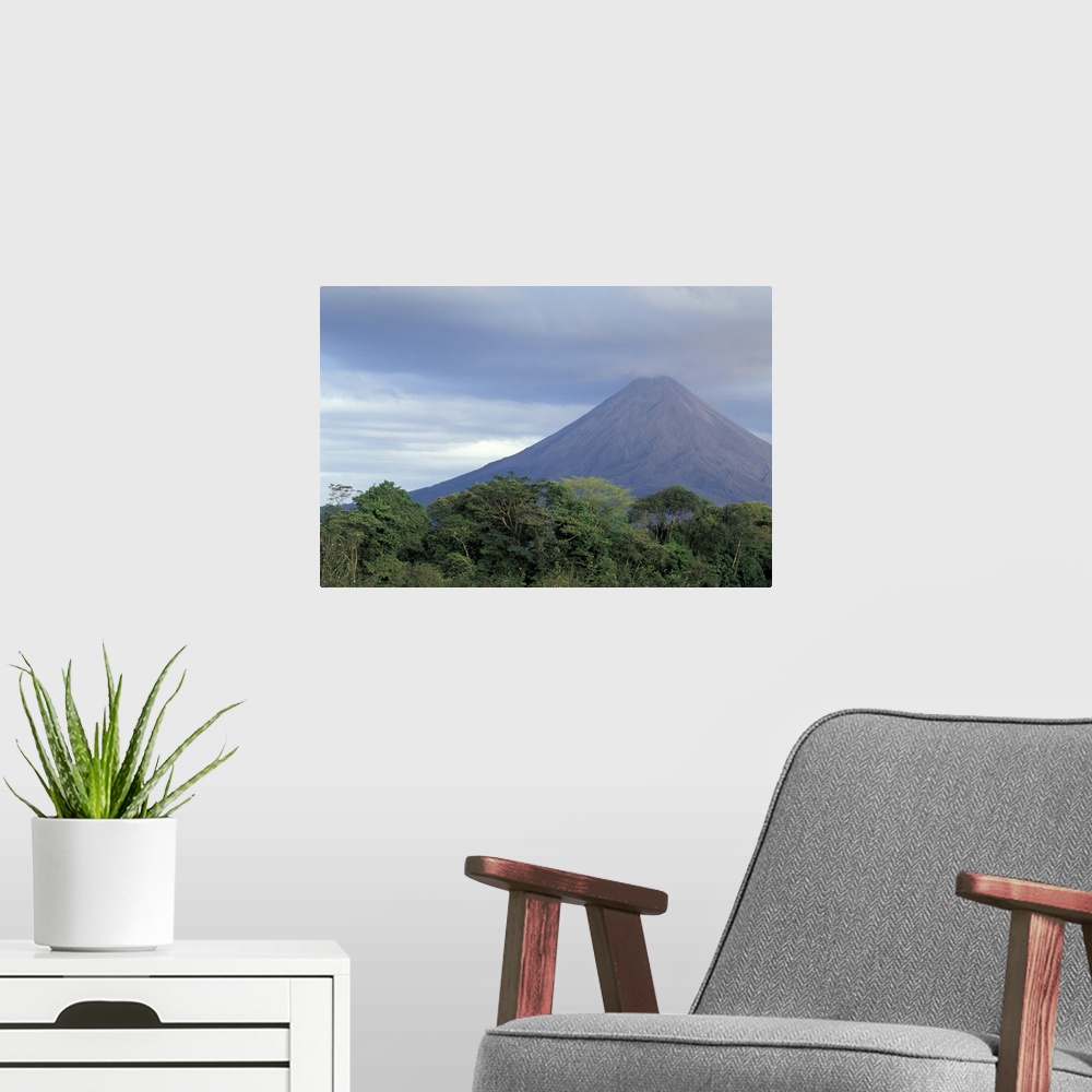 A modern room featuring Central America, Costa Rica, Arenal Volcano. Rainforest beneath Arenal (erupting since 1968).