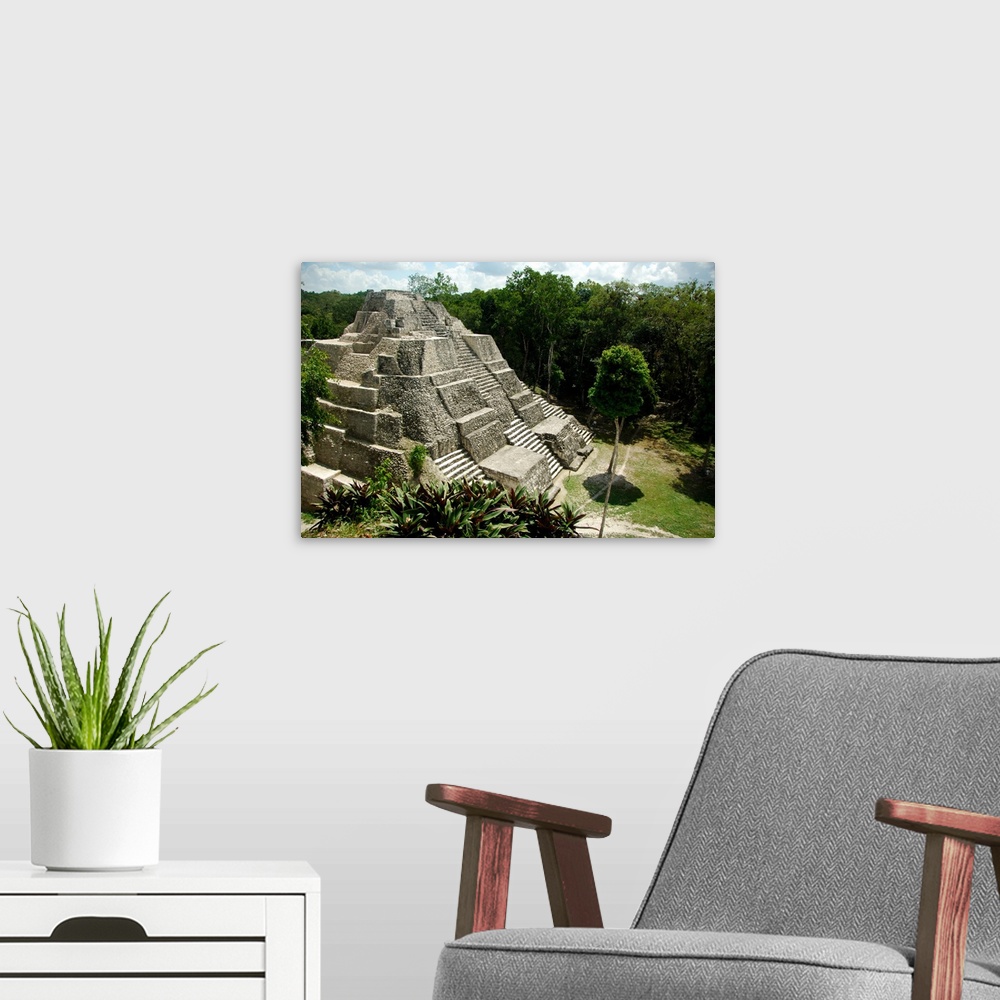 A modern room featuring Central America, Guatemala, Yaxha. Classic Mayan pyramid surrounded by jungle.