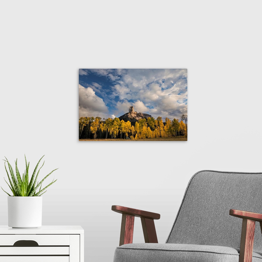 A modern room featuring Chimney Rock at sunset, from Owl Creek Pass, Cimarron range in autumn, San Juan Mountains, easter...