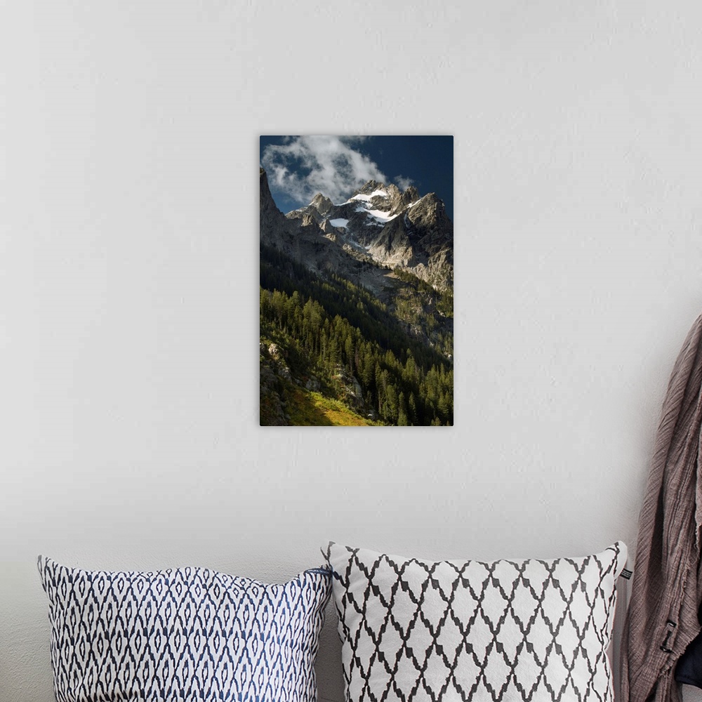 A bohemian room featuring Clouds around the High Peak of Mount Owen, Grand Teton National Park, Wyoming, USA.