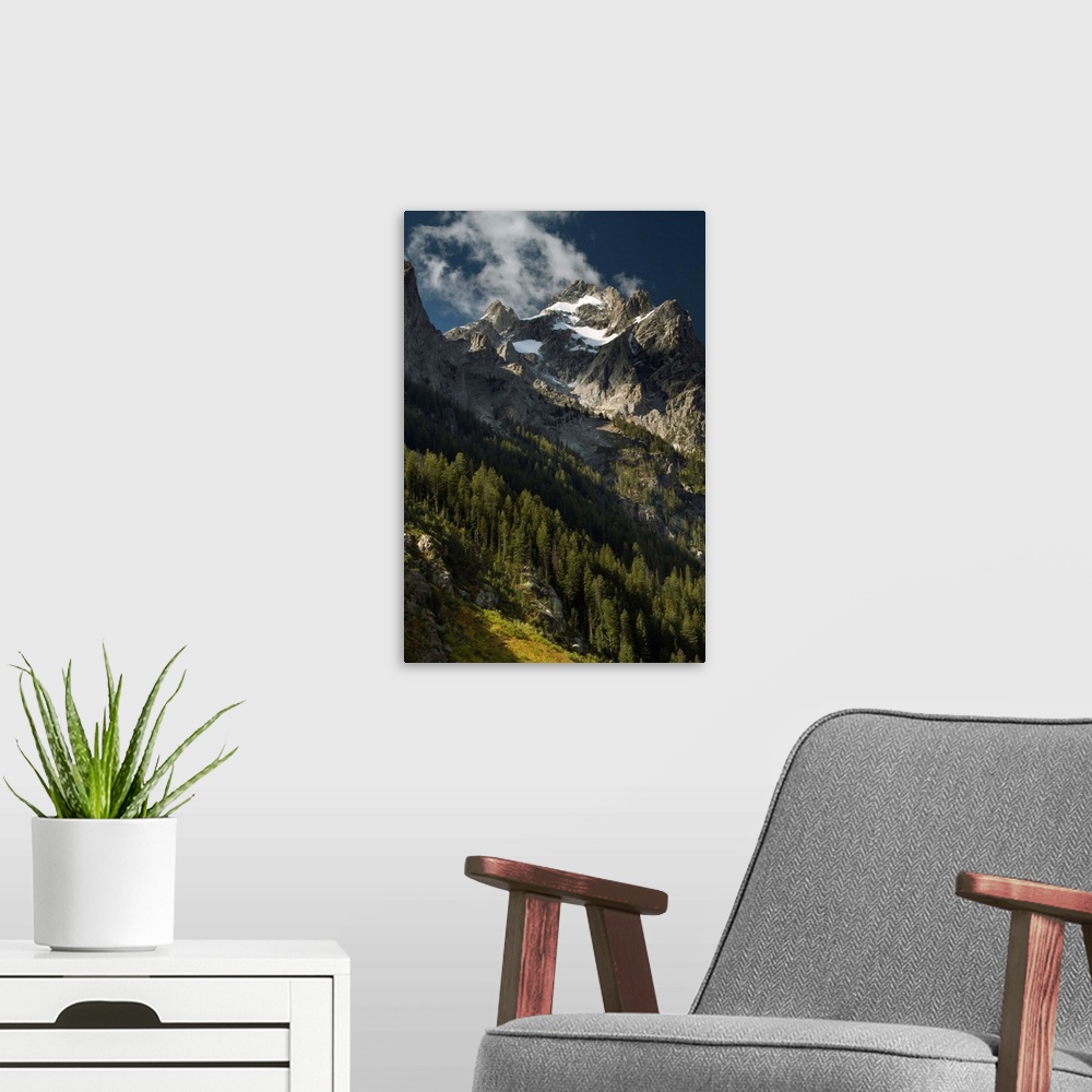 A modern room featuring Clouds around the High Peak of Mount Owen, Grand Teton National Park, Wyoming, USA.