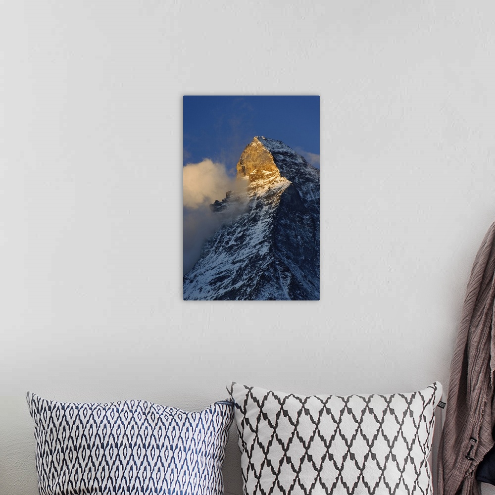 A bohemian room featuring Clouds around the summit of the Matterhorn at sunrise, Zermatt, Switzerland