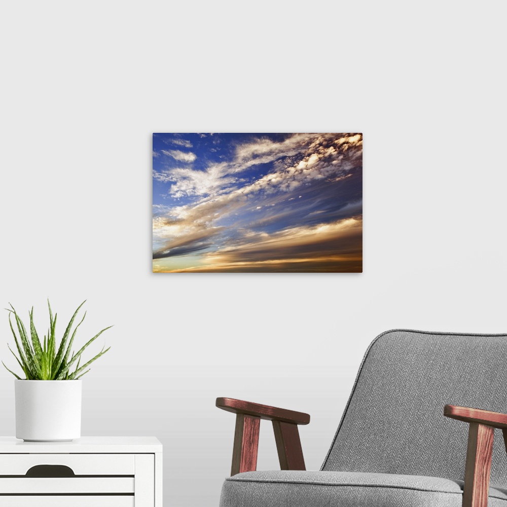 A modern room featuring Clouds at sunset, Maine