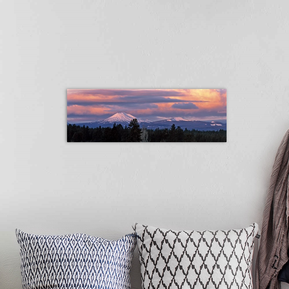 A bohemian room featuring USA, Oregon, Mt Bachelor. Clouds take on sunrise colors above Mt Bachelor in the Cascades Range n...