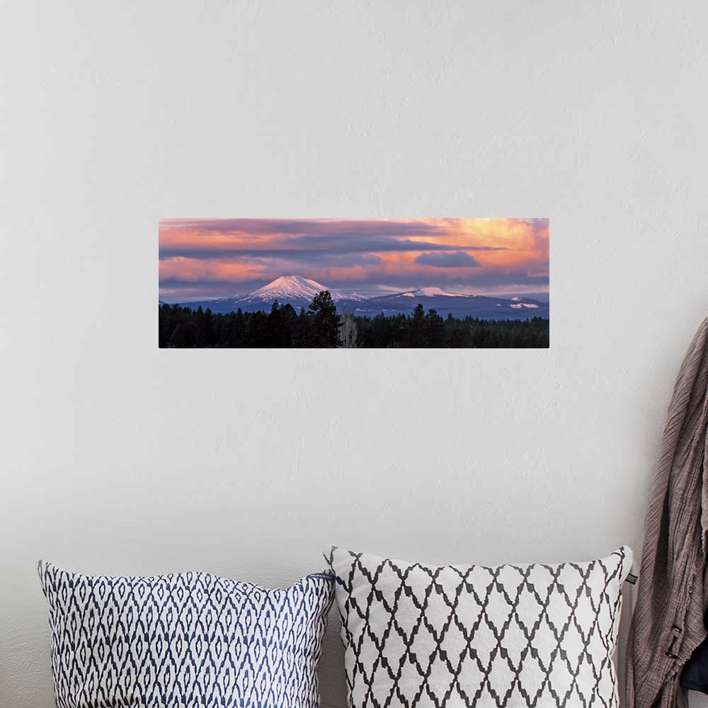 A bohemian room featuring USA, Oregon, Mt Bachelor. Clouds take on sunrise colors above Mt Bachelor in the Cascades Range n...