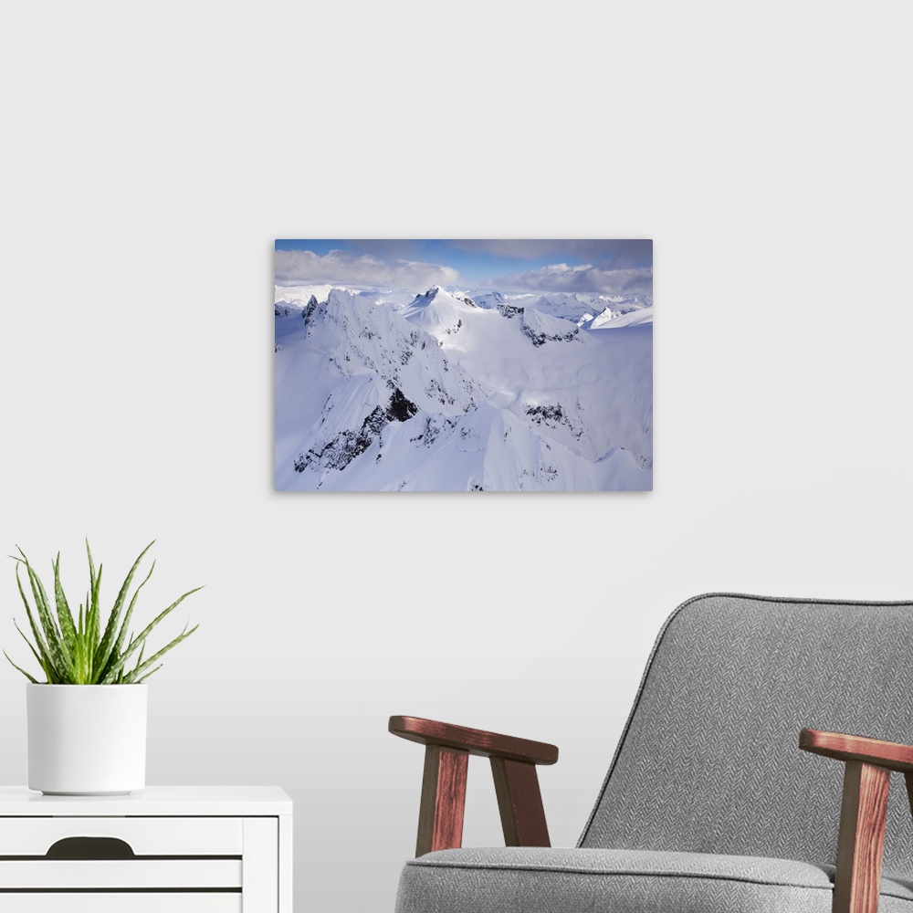 A modern room featuring Aerial view of deep snow in the Coast Mountains, near Squamish and Whistler, British Columbia, Ca...