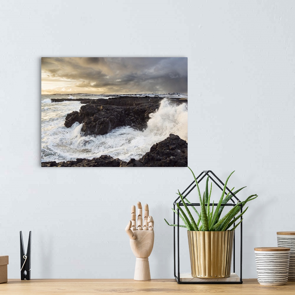 A bohemian room featuring Coastline at Brimketill during stormy conditions at sunset. The coast of the north Atlantic on Re...