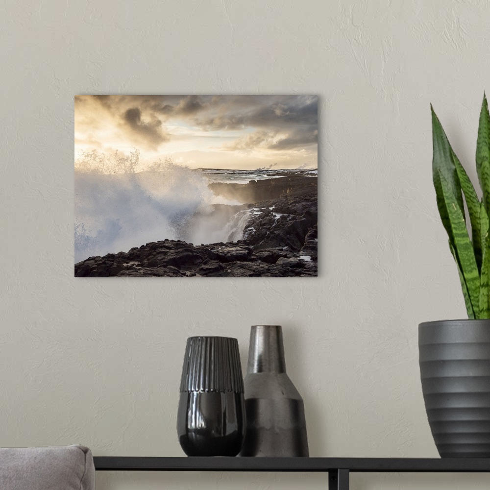 A modern room featuring Coastline at Brimketill during winter storm conditions at sunset. Reykjanes Peninsula, Iceland.