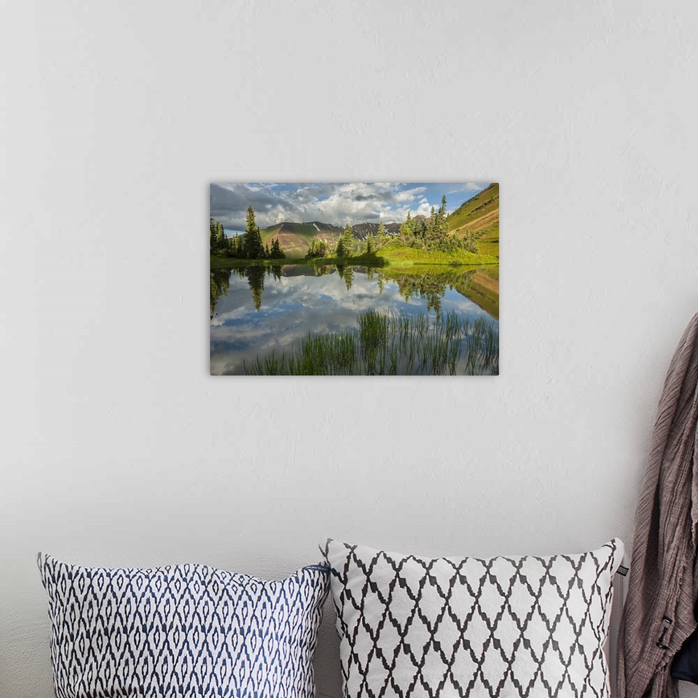 A bohemian room featuring USA, Colorado, Gunnison National Forest. Paradise Divide and pond reflection.