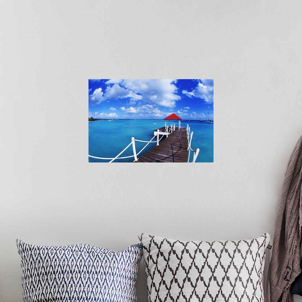 A bohemian room featuring Colorful graphic of dock in St. Francois, Guadeloupe.
