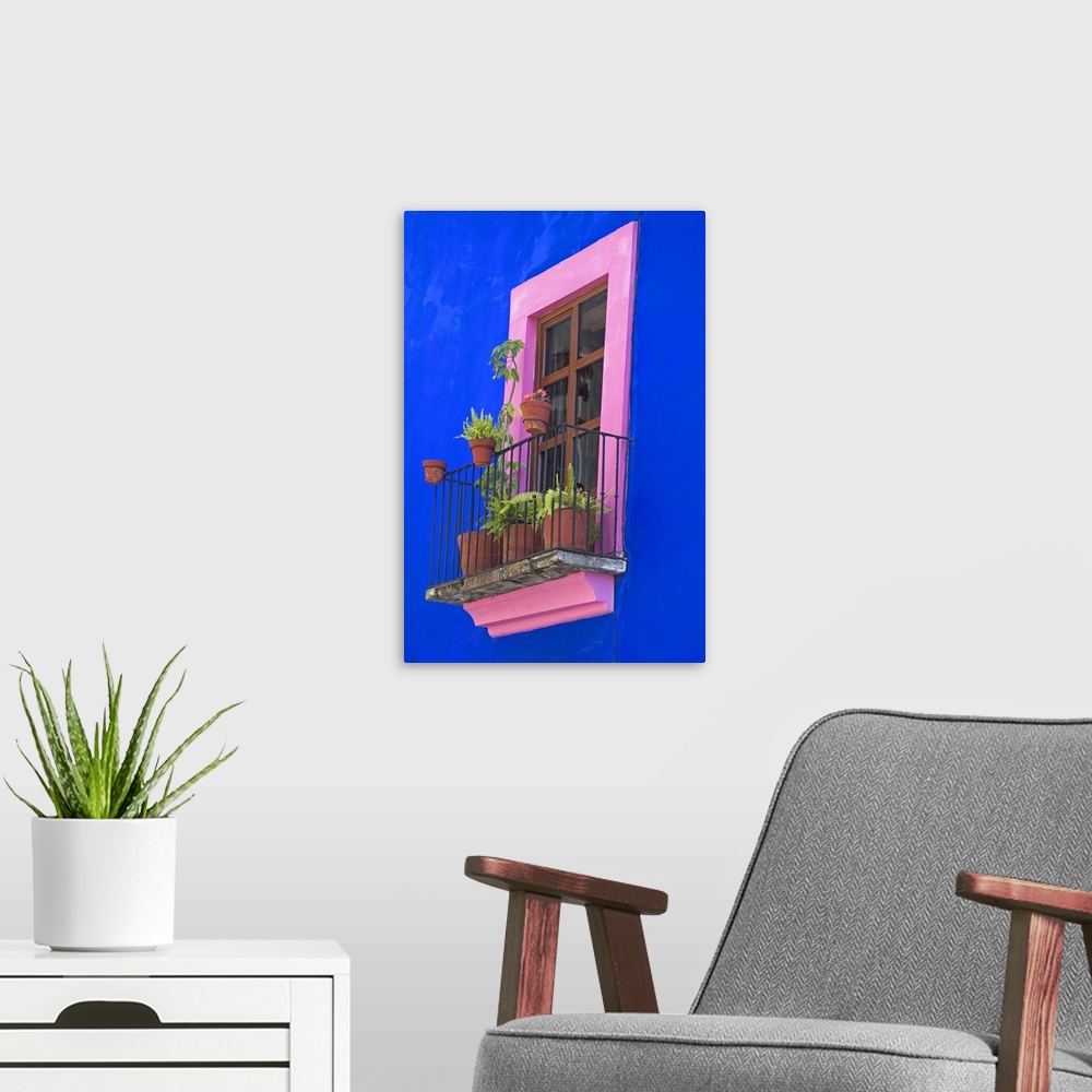 A modern room featuring Colorful window on a building in the city of Puebla, Puebla, Mexico.