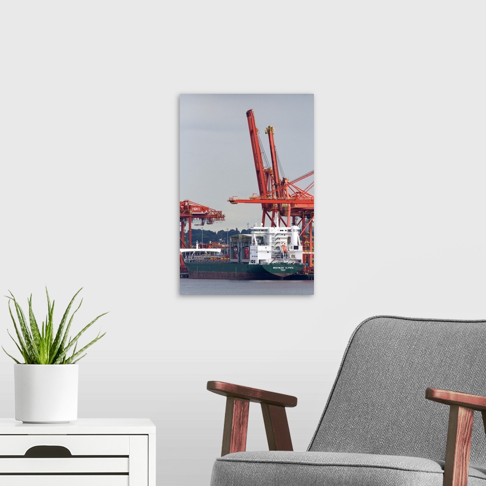 A modern room featuring Container ship at Port Vancouver in British Columbia, Canada.