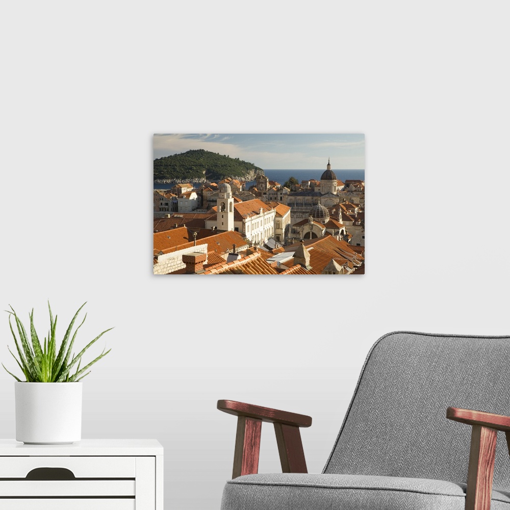 A modern room featuring Europe, Croatia, Dalmatia, Dubrovnik.  Red tile roofs dominate the old city of Dubrovnik, viewed ...