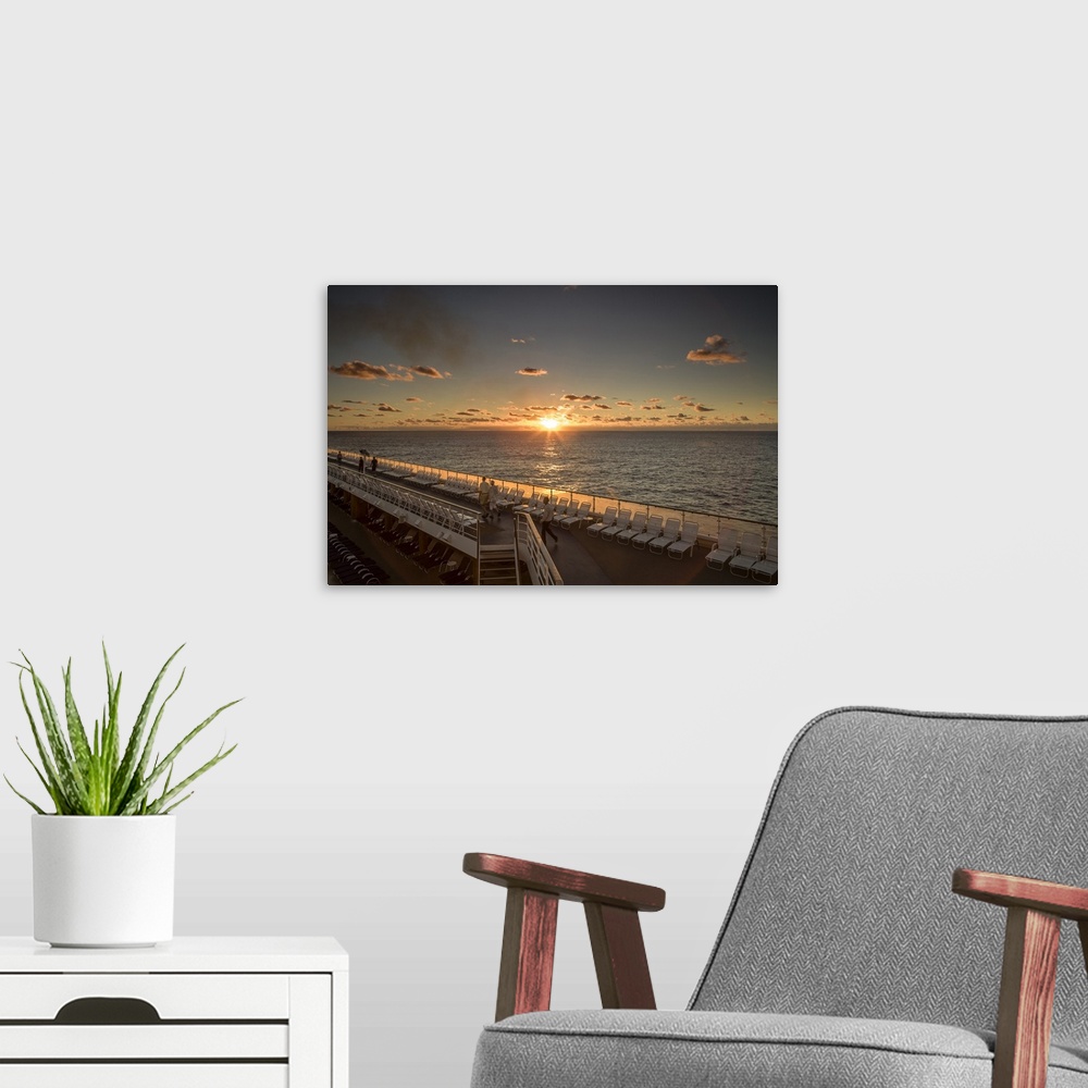 A modern room featuring Cruise sunrise. Atlantic Ocean.