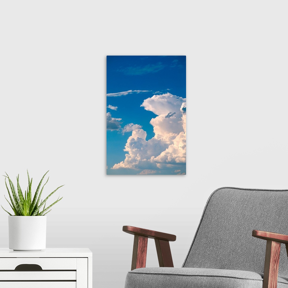A modern room featuring Cumulus clouds in a blue sky.