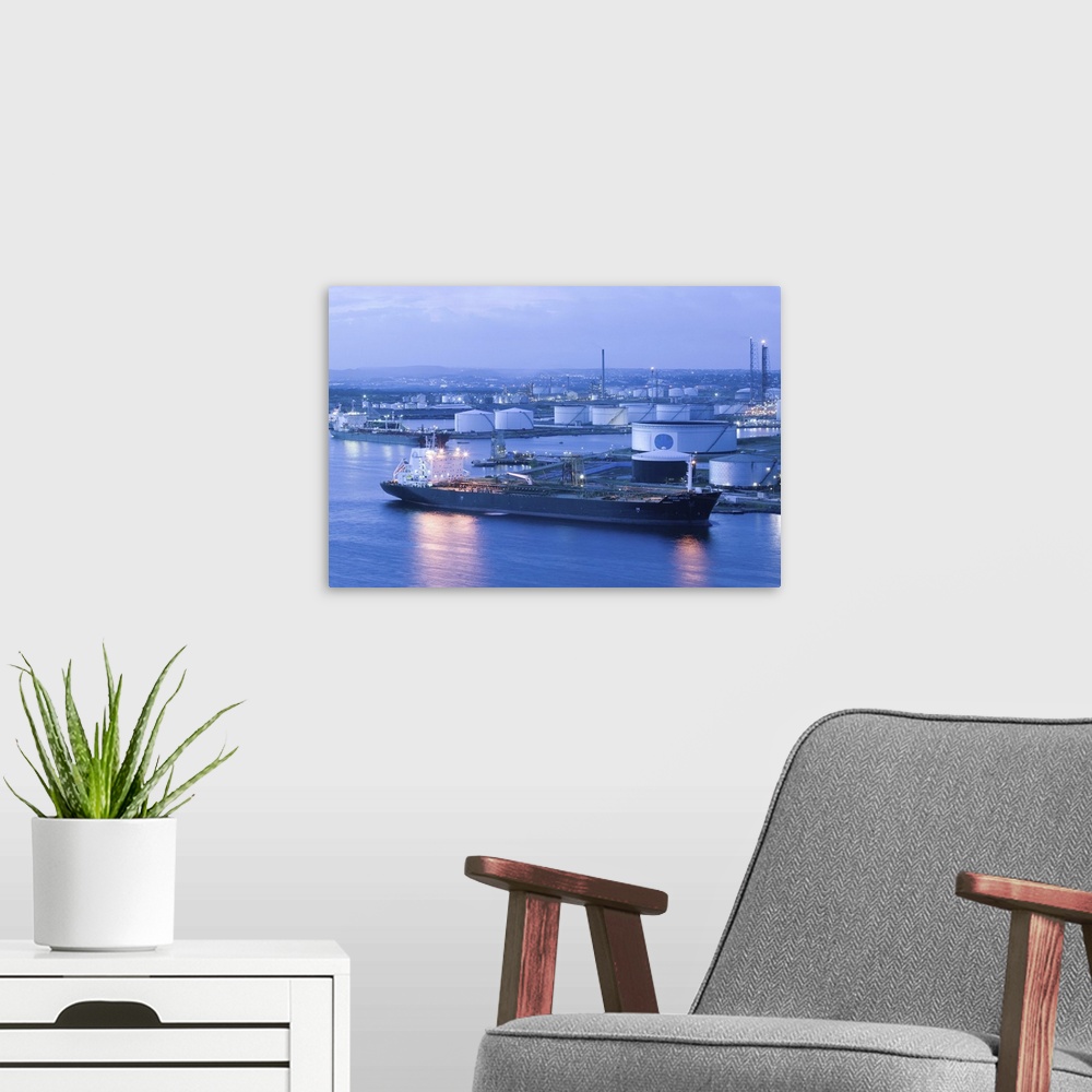 A modern room featuring ABC Islands-CURACAO-Willemstad:.Oil Tankers at Curacao Island Oil Refinery / Evening