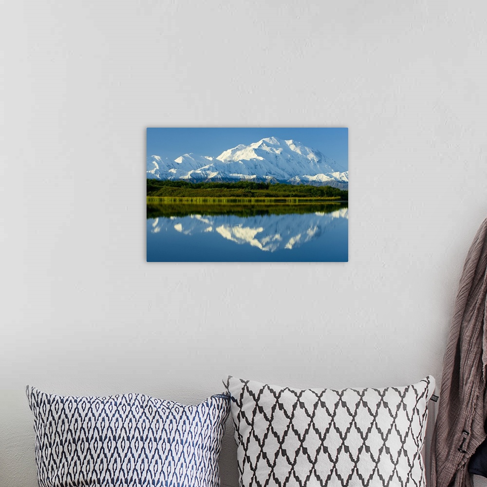 A bohemian room featuring Denali (Mt. McKinley), at over 20,000 feet, the highest mountain in North America, rises above th...
