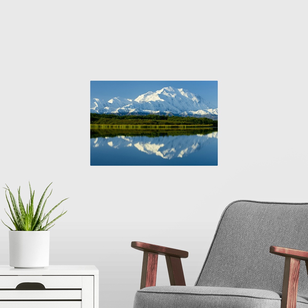 A modern room featuring Denali (Mt. McKinley), at over 20,000 feet, the highest mountain in North America, rises above th...
