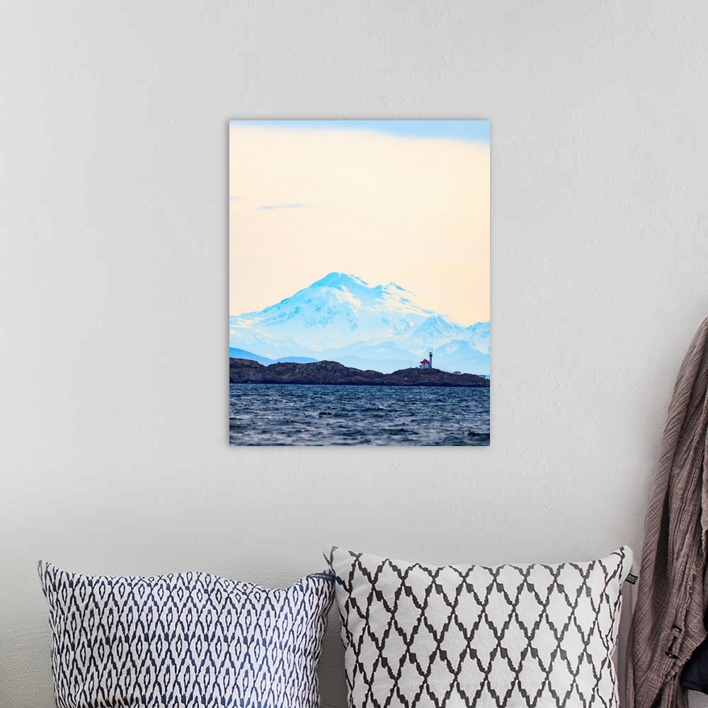 A bohemian room featuring Discovery Island Lighthouse, Victoria, BC against Mt. Baker in WA