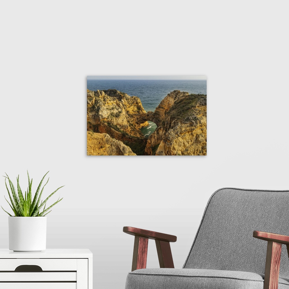 A modern room featuring Dramatic Cliffs along the coast at Ponta da Piedade in Lagos, Portugal.