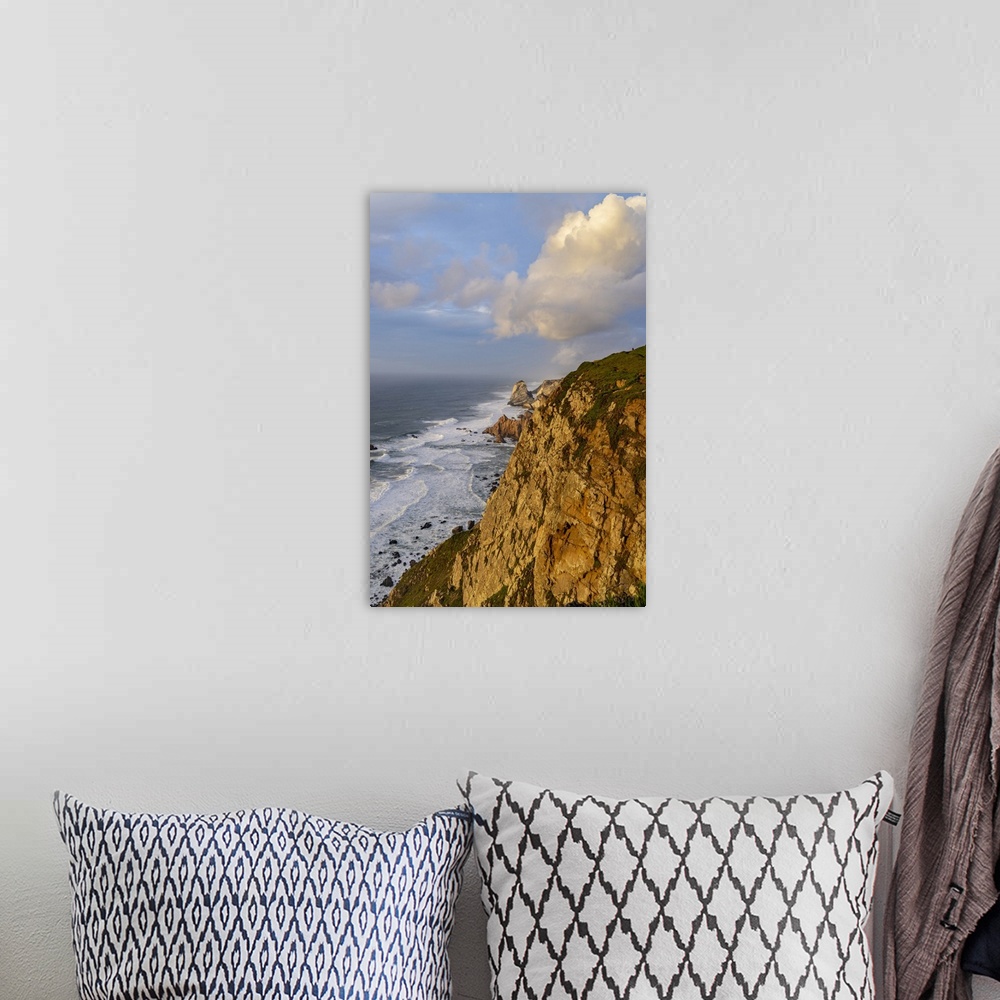 A bohemian room featuring Dramatic seaside cliffs at Cabo do Roca in Colares, Portugal.