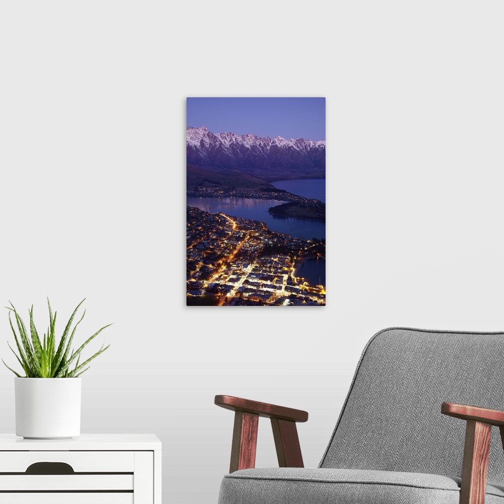 A modern room featuring Dusk over Queenstown and Lake Wakatipu, South Island, New Zealand