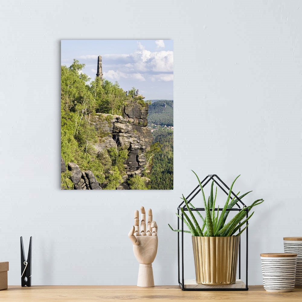 A bohemian room featuring Elbe Sandstone Mountains. Mount Lilienstein, Monument for the house of Wettin, Germany, Saxony.