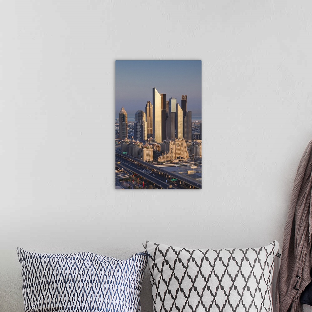 A bohemian room featuring UAE, Dubai, Downtown Dubai, elevated view of skyscrapers on Sheikh Zayed Road from downtown, dawn