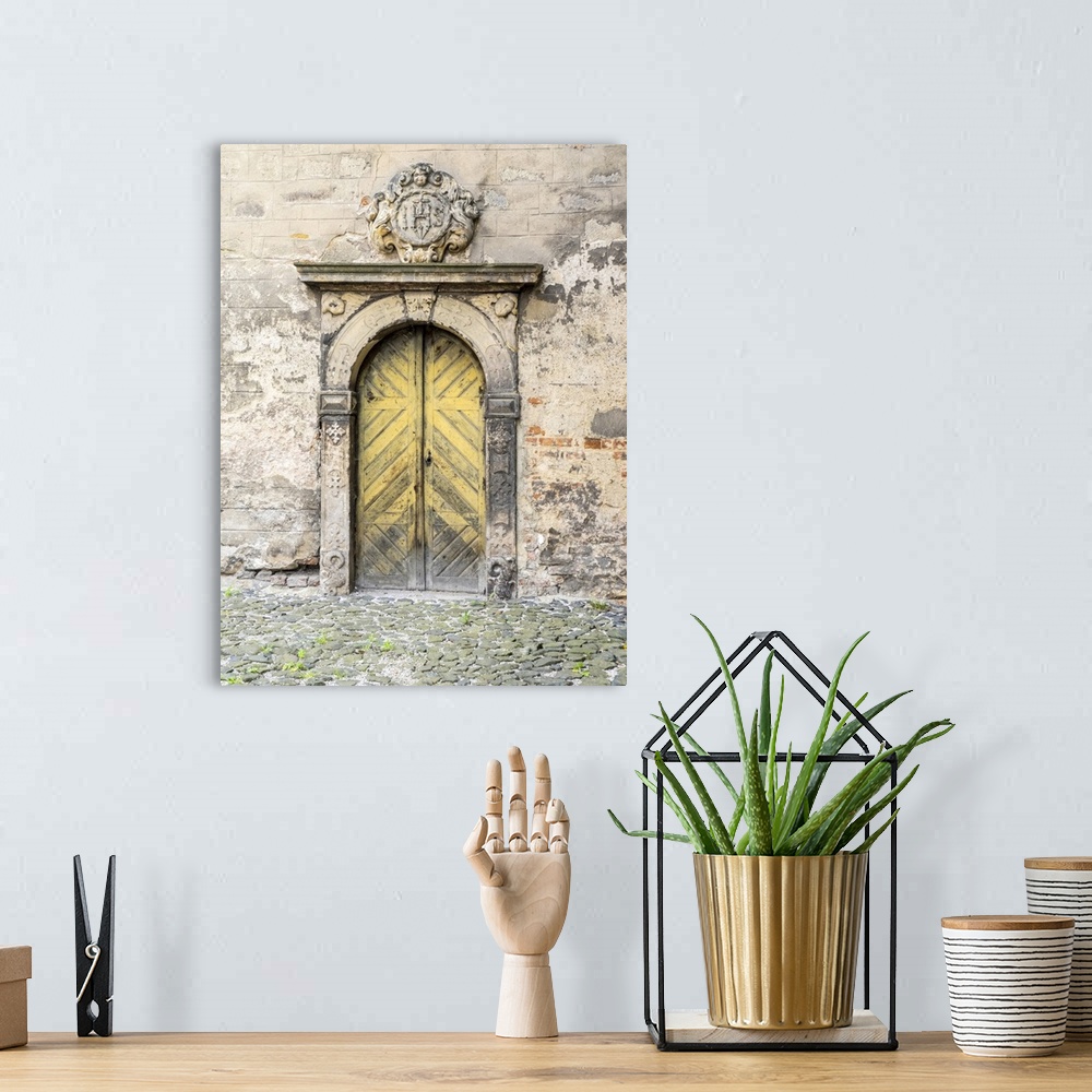 A bohemian room featuring Europe, Czech Republic, Jicin. Doorway entrance to a church in the historic town of Jicin.