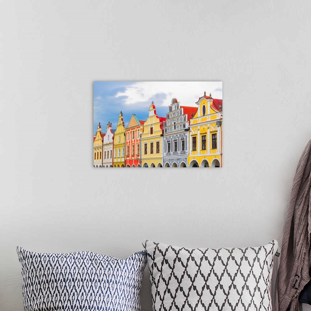 A bohemian room featuring Europe, Czech Republic, Telc. Colorful houses on main square. Credit: Jim Nilsen