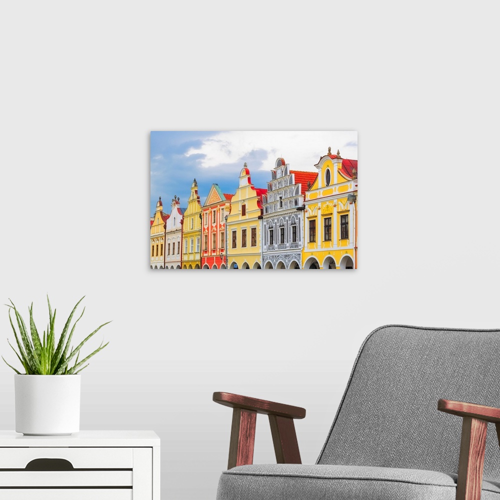 A modern room featuring Europe, Czech Republic, Telc. Colorful houses on main square. Credit: Jim Nilsen