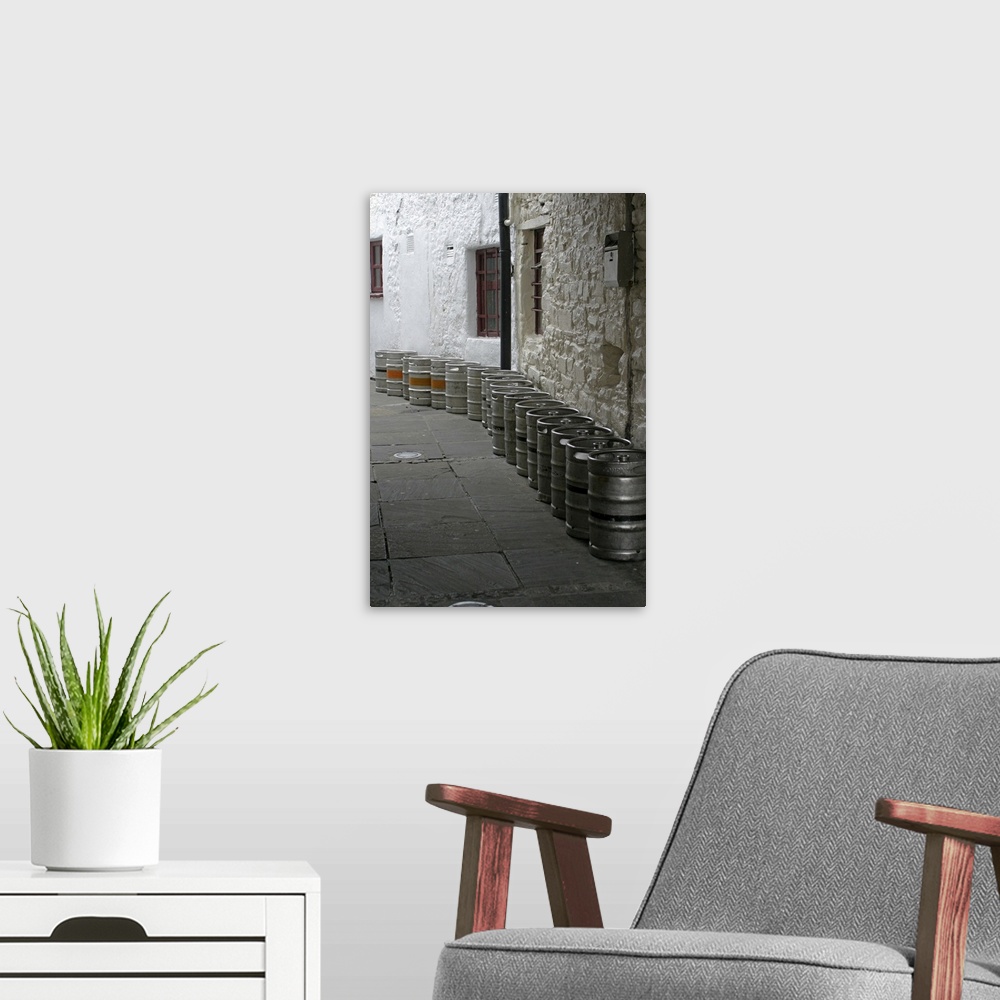 A modern room featuring Europe, Ireland, Westport. Kegs in an alley.