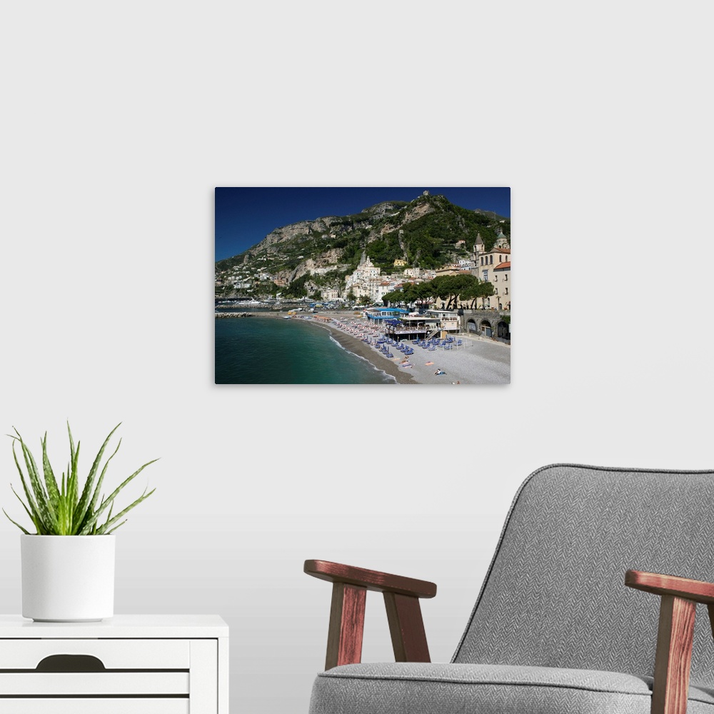 A modern room featuring ITALY-Campania-(Amalfi Coast)-AMALFI:.Town View with Beach / Morning... Walter Bibikow 2005
