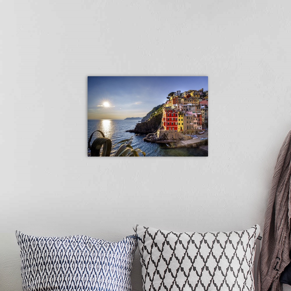 A bohemian room featuring Europe, Italy, Riomaggiore. Sunset on coastal town. Credit: Jim Nilsen