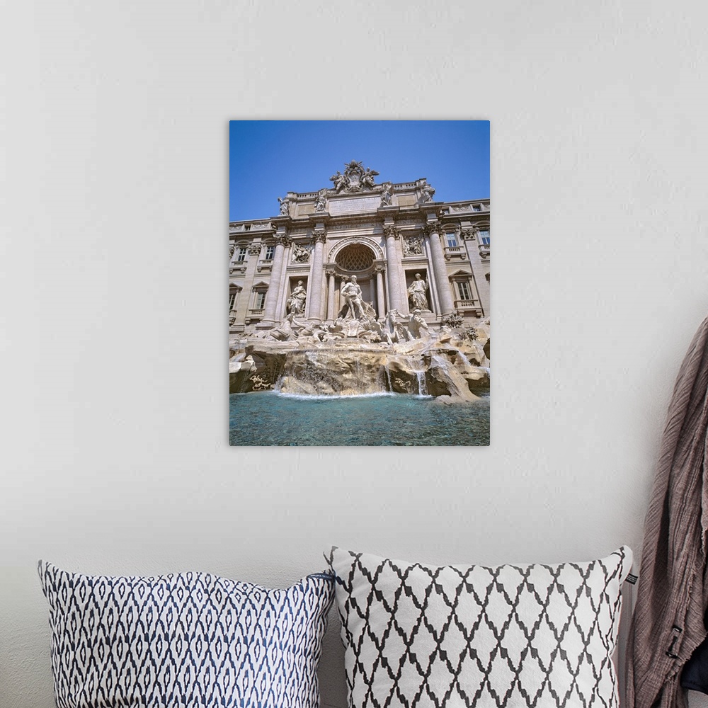 A bohemian room featuring Europe, Italy, Rome. Coins collect in the waters of Trevi Fountain in Rome, Italy.