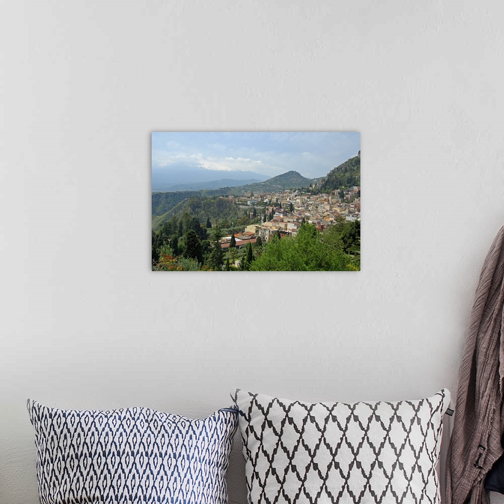 A bohemian room featuring Europe, Italy, Sicily, Taormina. Overview of Taromina, Mt. Etna in distance.
