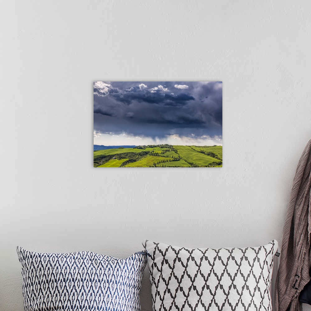 A bohemian room featuring Europe, Italy, Val d' Orcia. Storm clouds over Tuscany landscape. Credit: Jim Nilsen