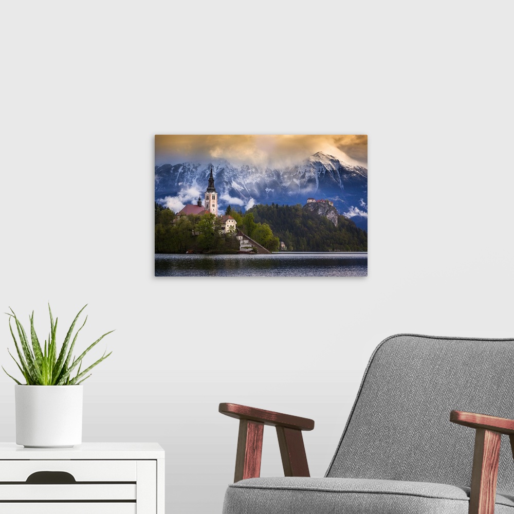 A modern room featuring Europe, Slovenia, Lake Bled. Church castle on lake island and mountain landscape. Credit: Jim Nil...